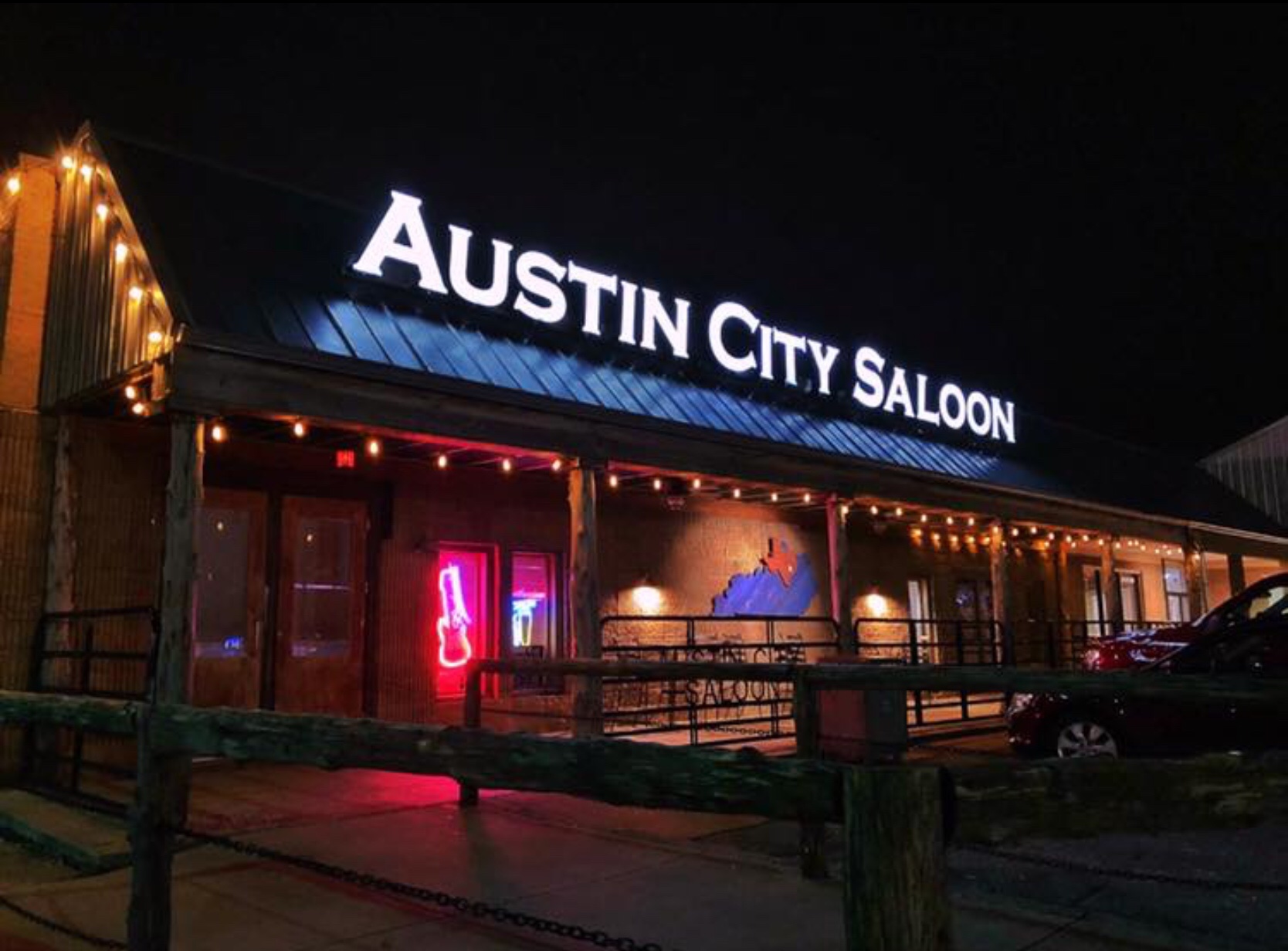 The lights of the Austin City Saloon at night