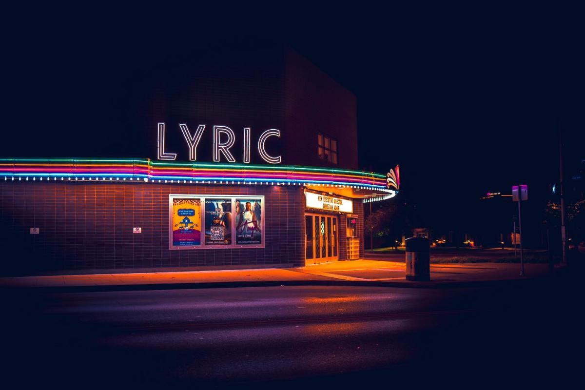 Neon lights up the Lyric Theatre at night