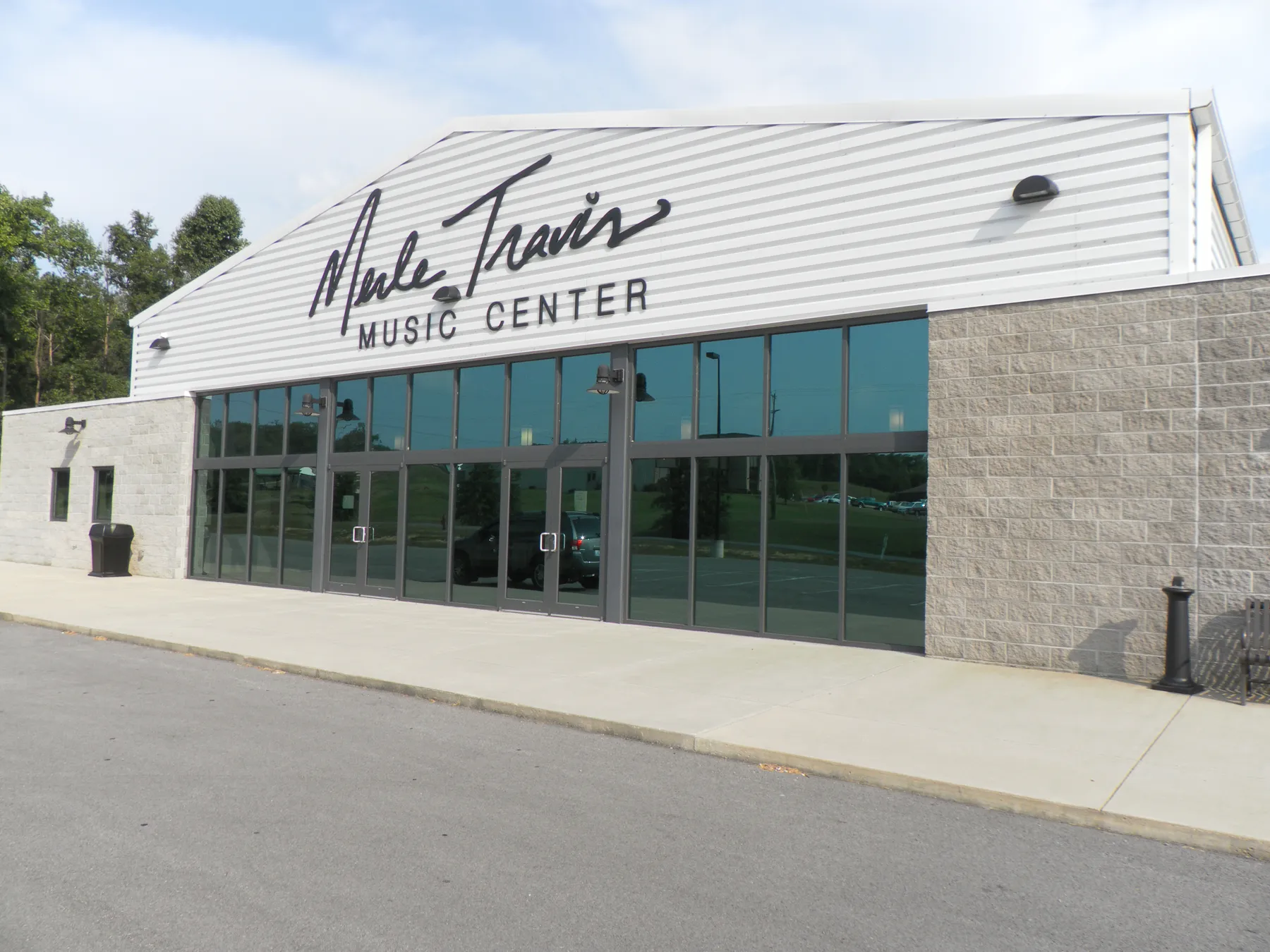 The exterior of the Merle Travis Music Center, a modern pole building.