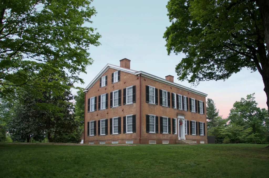 The traditional home of Stephen Foster, a two story brick building.