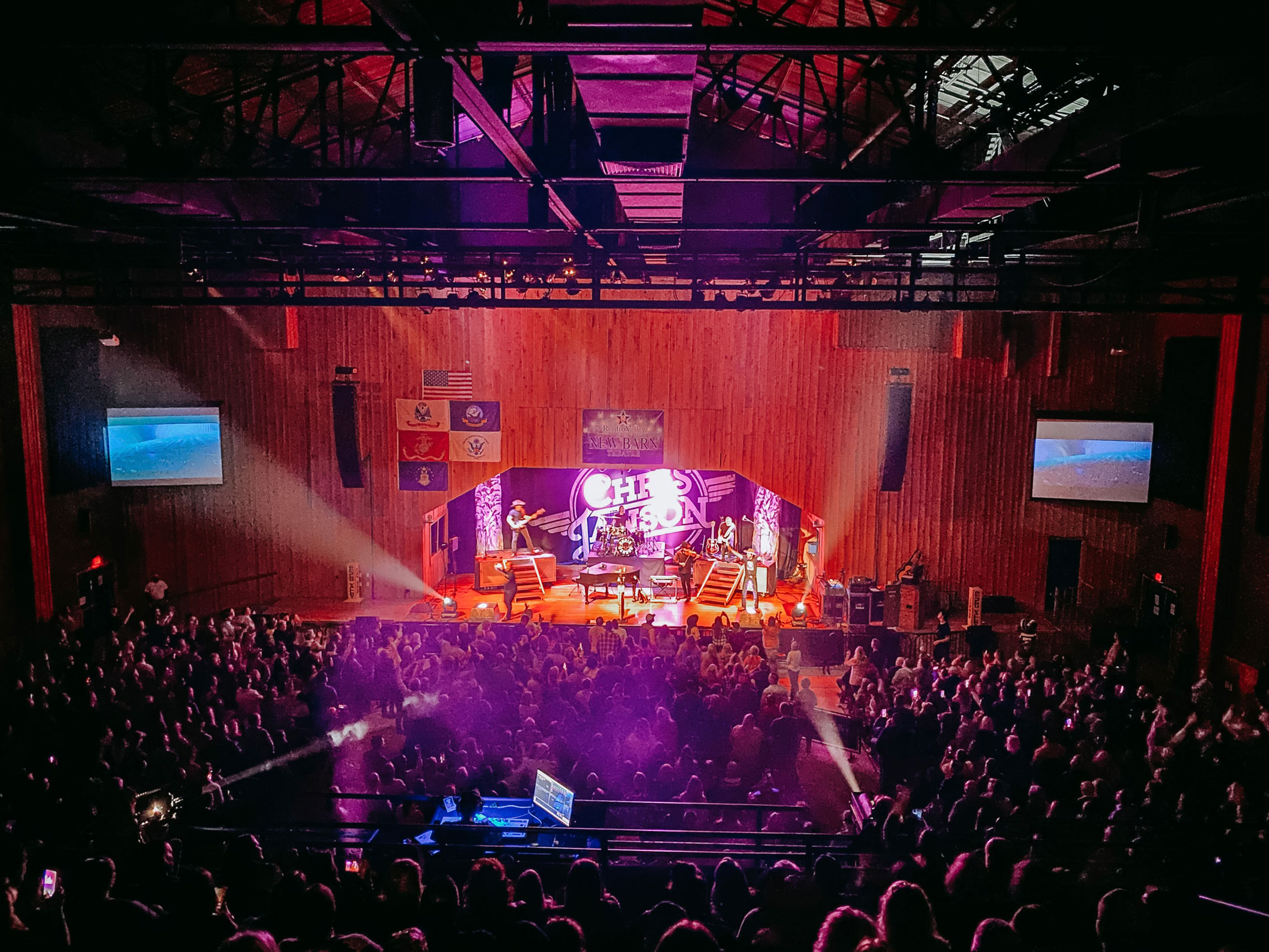 The interior stage of the Entertainment Center with red and purple lights