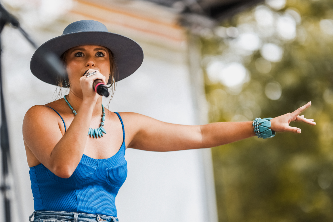 A singer performing on stage